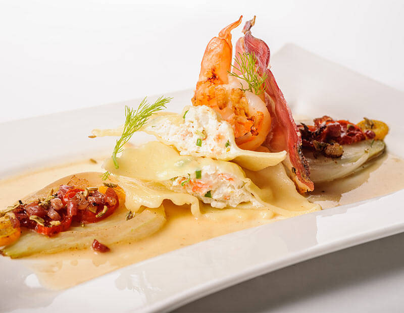 Ravioli aux crevettes et au speck